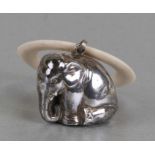 A Victorian style silver coloured metal teething ring in the form of an elephant, 3.3cms (1.3ins)