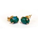 A pair of 14ct gold and malachite stud earrings.