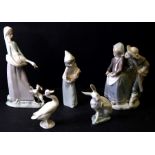 A quantity of Lladro figures to include Goose Girl with a Terrier Dog, 26cms (10ins) high;