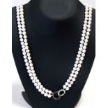 A double strand cultured pearl necklace.