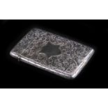 A Victorian silver visiting card case of rectangular form with engraved scrolling decoration and a