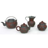 A Chinese Yixing Wen Hua Shun pewter and terracotta four-piece tea service.