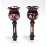 A pair of Bohemian flashed glass vases, 28cms (11ins) high (2).