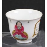 A Chinese famille rose footed cup decorated with figures and calligraphy, red seal mark to the