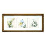 A group of three still life watercolours on silk depicting flowers, each 11 by 11cms (4.25 by 4.