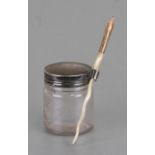 A glass ink jar impressed 'Jas M Higgins & Co, 3oz, Brooklyn, NY' with silver cover with pen holder,