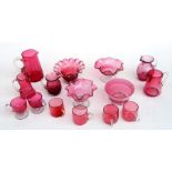 A quantity of Cranberry glass items to include bonbon dishes, jugs and similar items.