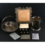 A George III style silver plated swing handled bread basket; together with other silver plated items