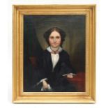 Victorian school - a half length portrait of a young lady, oil on canvas, framed, 29 by 37cms (11.25