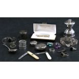 A quantity of silver items to include a silver pepper mill, Birmingham 1912; two silver and mother