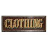 A distressed painted sign 'Clothing', overall 127 by 46cms (50 by 18ins).