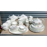 A Wedgwood Flame Rose six-person tea, coffee and dinner service to include two tureens and covers,