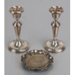 A pair of silver George III style dwarf candlesticks, loaded, Birmingham 1994, weight 202g all in,