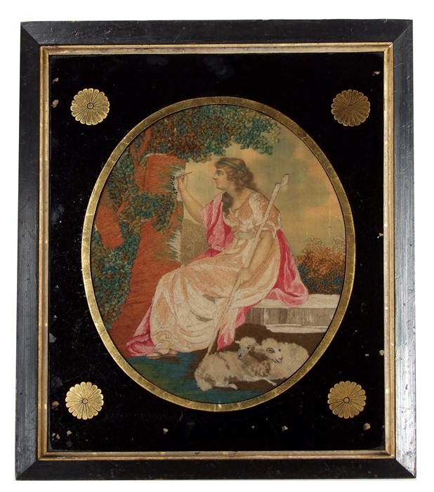 An 18th century woolwork on silk picture of a shepherdess and her flock, framed & glazed, 24 by