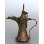 A Turkish / Islamic copper dallah coffee pot, 25cms (9.75ins) high.