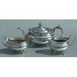 A Chinese four-piece silver tea set in George III Western taste, the teapot, cream jug and sugar bow