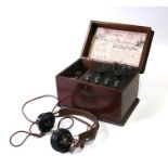 A Revophone crystal radio set with four antenna loops and Bakelite headphones, 26cms (10.25ins)