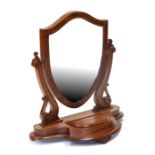 A Victorian mahogany shield shaped toilet mirror.