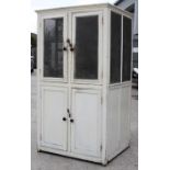 An early 20th century painted pine meat safe and food cupboard, 97cms (38ins) wide.