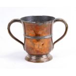 A 19th century copper loving cup, impressed with the Royal cypher and No. 2, 15cms (6ins) high.