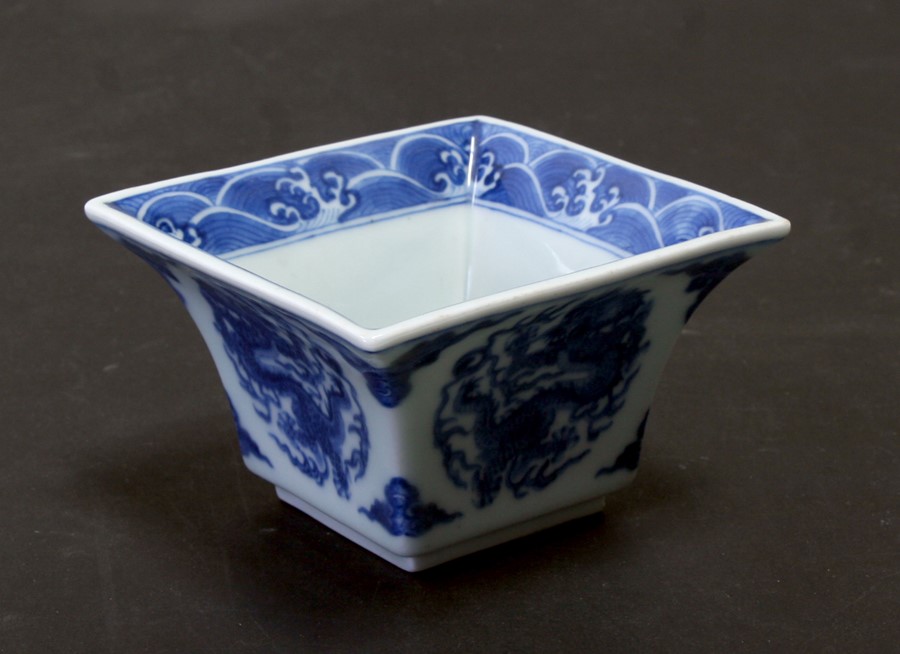 A Chinese blue and white square form bowl decorated dragons with blue seal mark to the underside.6cm - Image 2 of 4