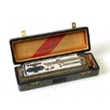 A Hohner Ladler Super Chromonica harmonica, cased.