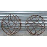 A pair of metal garden spheres, 42cms (16.25ins) diameter (2).