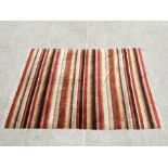 A large Laura Ashley chenille rug of multi coloured stripe design, 240 by 168cms (94.5 by 66ins).