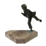 A bronze figure depicting a running boy holding a chicken, on a marble base, 13cms (5ins) high.