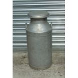 An Express Dairy Co. 10-gallon aluminium milk churn.