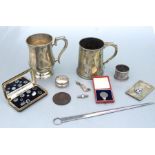 A quantity of silver and silver plated items to include a silver notebook with HMS Tiger enamel