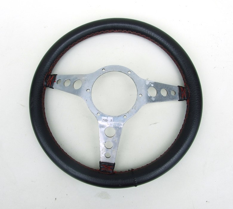 A leather rimmed aluminium three-spoke dished steering wheel, 36cms (14ins) diameter. - Image 2 of 2