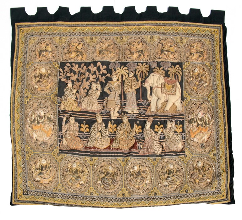 A large Burmese Kalaga tapestry wall hanging depicting numerous figures, mythical animals and