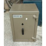 A Dudley Safes free standing safe with key, 46 by 64cms (18 by 25ins).