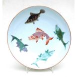 A large Chinese shallow bowl decorated with fish, 34cms (13.25ins) diameter.Condition ReportVery