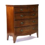 A Regency figured mahogany bowfront chest of two short and three graduated long drawers, 101cms (