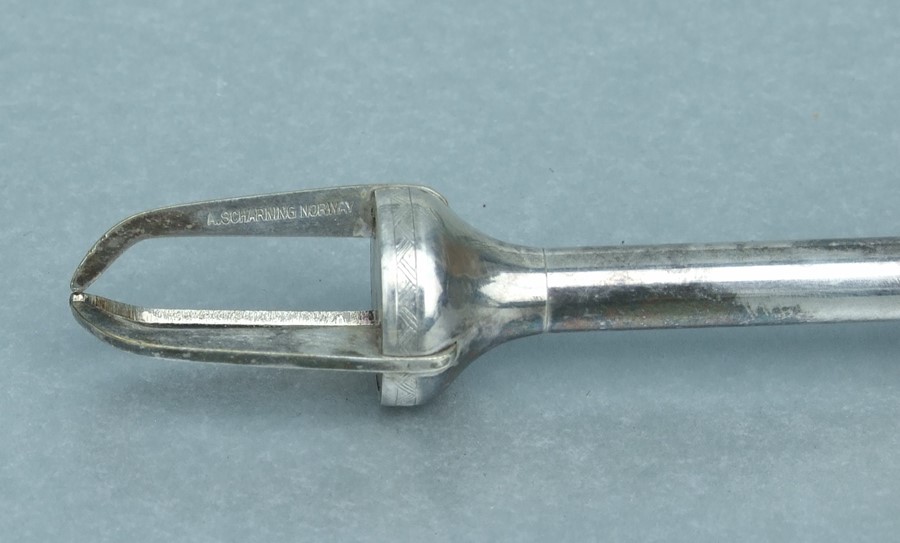 A Scharning Norway silver coloured metal and enamel Art Deco sugar cube grabber or cocktail and - Image 2 of 2