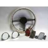 Assorted MG spares including a MG Midget steering wheel, seat belts, wing mirrors and other items.