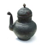 A Tibetan / Islamic tinned copper teapot, 28cms (11ins) high.