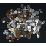 A collection of GB and foreign coinage including silver crowns and half crowns.