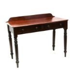 A Victorian mahogany side table with two frieze drawers on turned legs, 105cms (41.25ins) wide.
