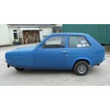 A 1974 Reliant Robin MkI, registrations number RUN 557N, blue. This MkI Robin is believed to be