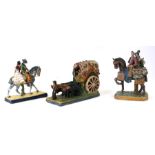 A Spanish pottery group depicting an ox cart, 31cms (12.75ins) long; together with two similar