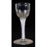 An 18th century wine glass with double helix air twist stem, 12.5cms (5ins) high.Condition