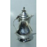A Persian white metal coffee pot with engraved decoration, 19cms (7.5ins) high. 335g