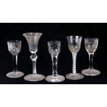 A group of 18th and 19th century wine glass to include etched, faceted and air twist stem