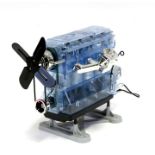 A Trends UK Ltd model of a four cylinder engine, with moving parts and sound effects, 26 cm, 10