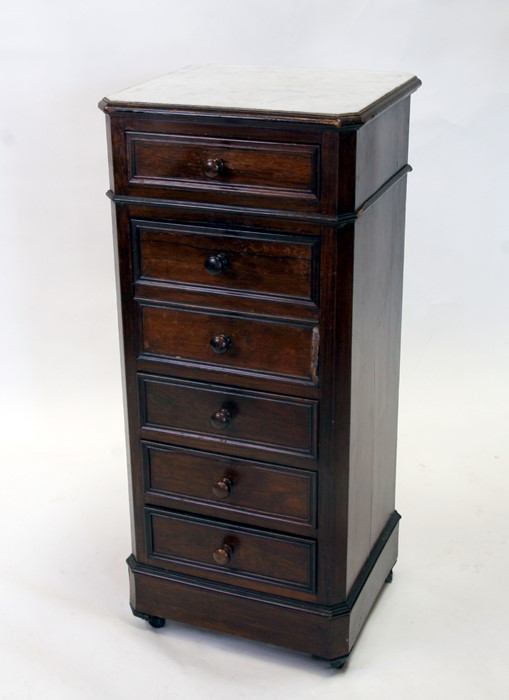 A French walnut cabinet with marble top above a pot cupboard and an arrangement of drawers, on a