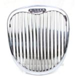 A Singer Rootes Group bonnet grille, ideal for display purposes, 37cms (14.5ins) diameter.