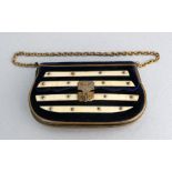 A 19th century gilt metal and ivory mounted velvet leather lined coin purse, 10cms (4ins) wide.